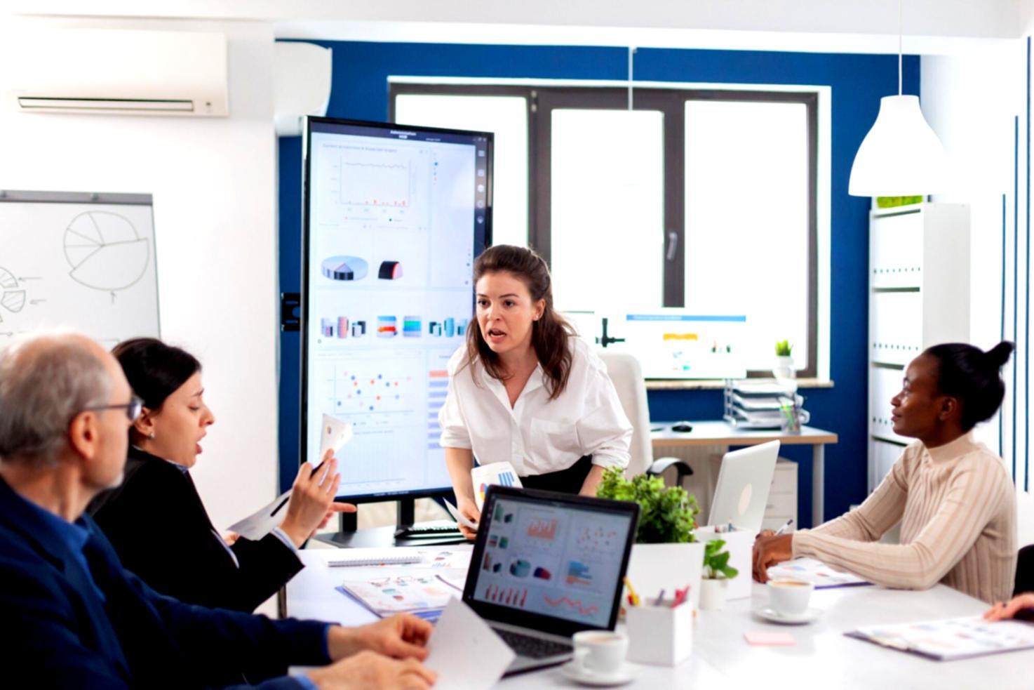 Investment professionals collaborating on financial analysis